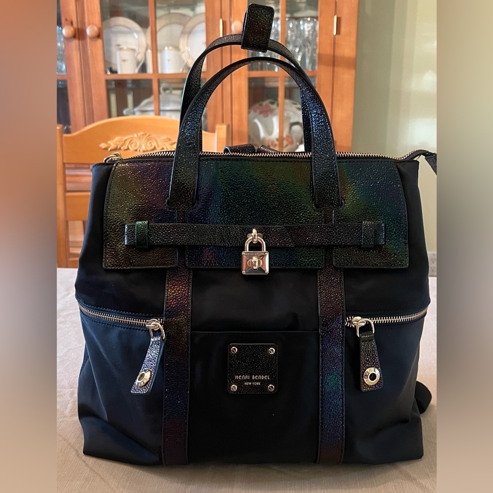 Henri Bendel Jetsetter backpack with petrol leather trim